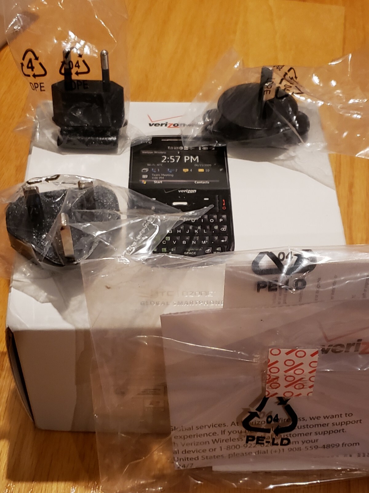 Htc/Ozone Smartphone  Accessories in black. 3 New International Adaptors