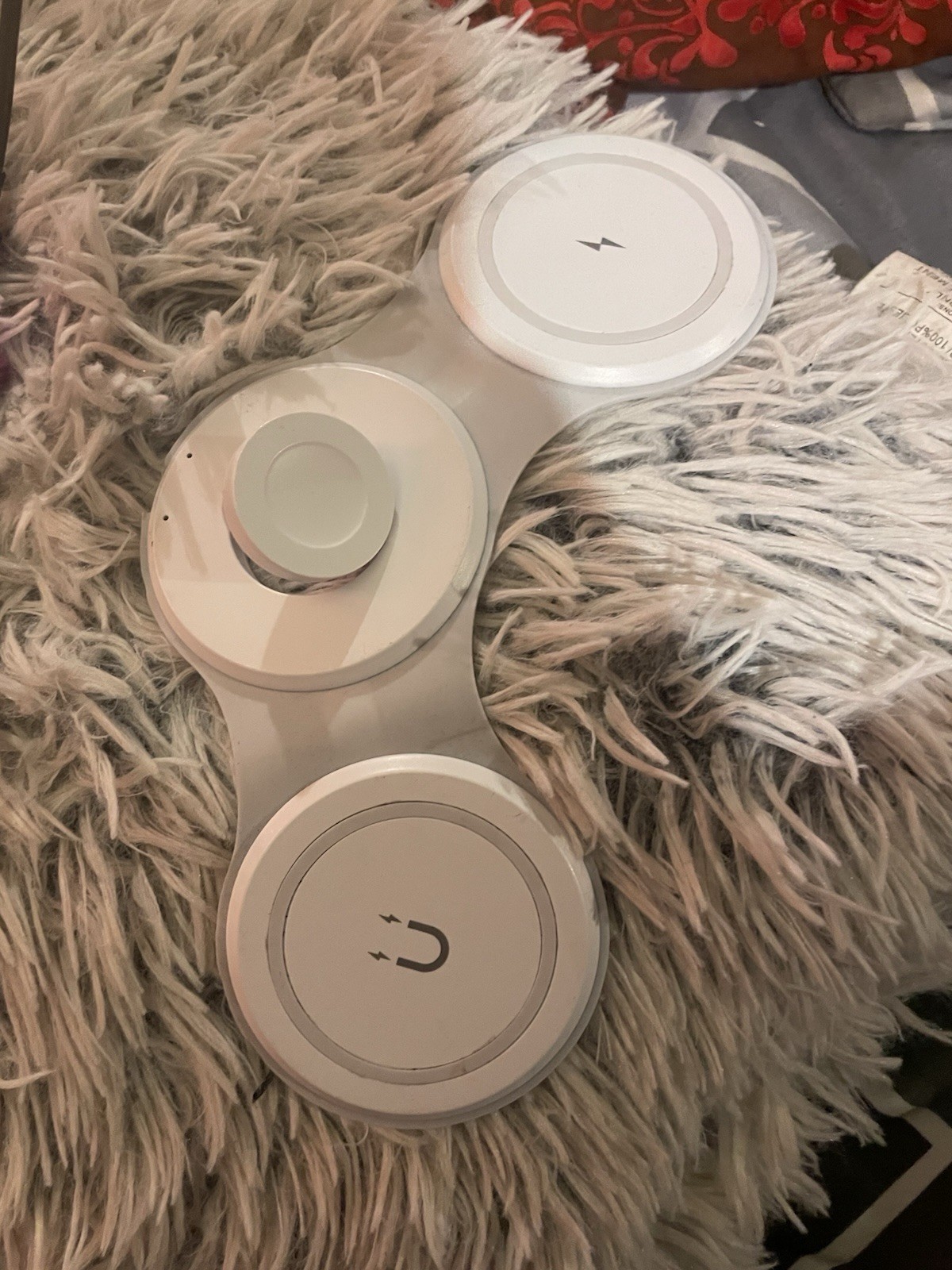 Apple Three And One Charger Charge His Phone Earbuds And Watch